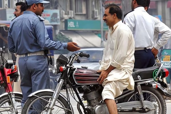 lahore's traffic boss cracks down on helmetless riders